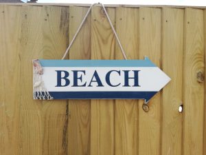 beach sign in garden beeches holiday lets